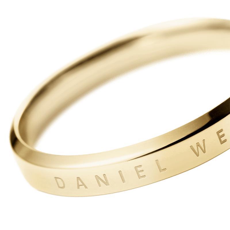 Elegant gold Daniel Wellington Classic Ring crafted from polished stainless steel with a minimalist engraved logo.