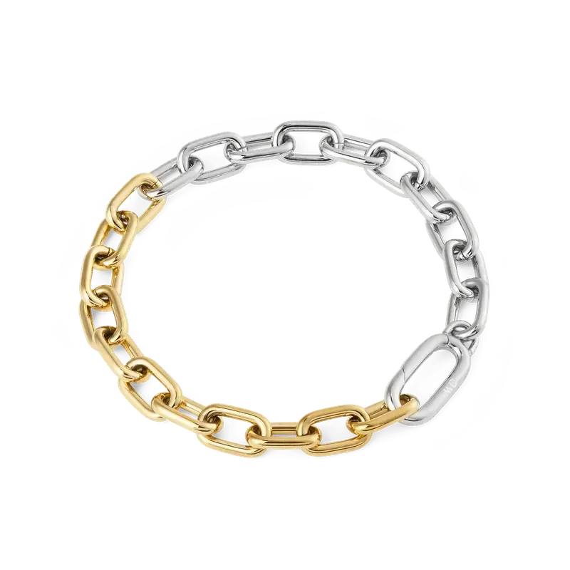 Daniel Wellington two-tone link bracelet featuring polished silver and warm yellow gold square links.