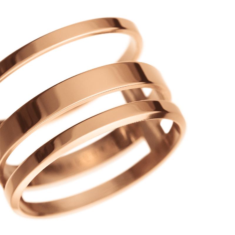 Elegant rose gold plated stainless steel Elan Triad ring featuring a sophisticated triple-band statement design.