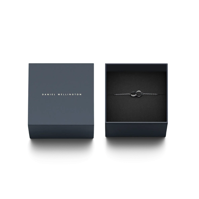 Daniel Wellington Elan Unity silver stainless steel bracelet featuring interlocking rings, presented in a branded gift box.