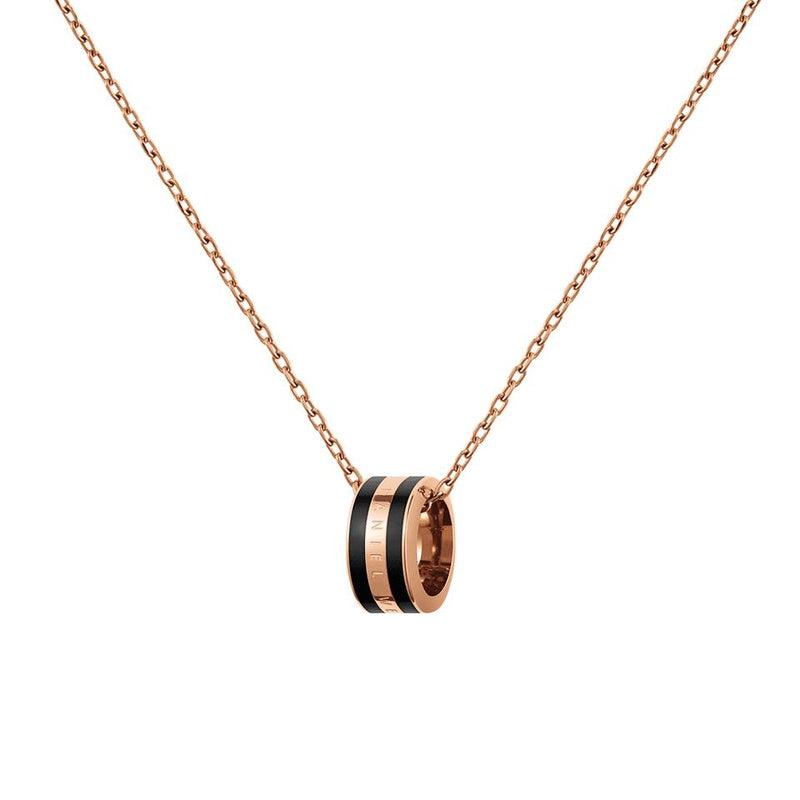 Elegant rose gold Daniel Wellington Emalie necklace featuring a sleek black enamel ring pendant on a delicate chain.
