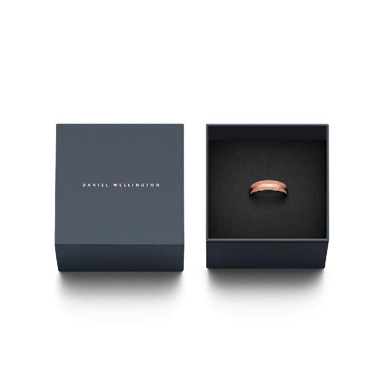 Daniel Wellington Emalie Ring in rose gold with enamel inlay, presented in a branded gift box.