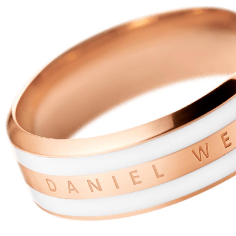 Daniel Wellington Emalie ring in rose gold stainless steel with a sleek white enamel inlay and engraved logo.