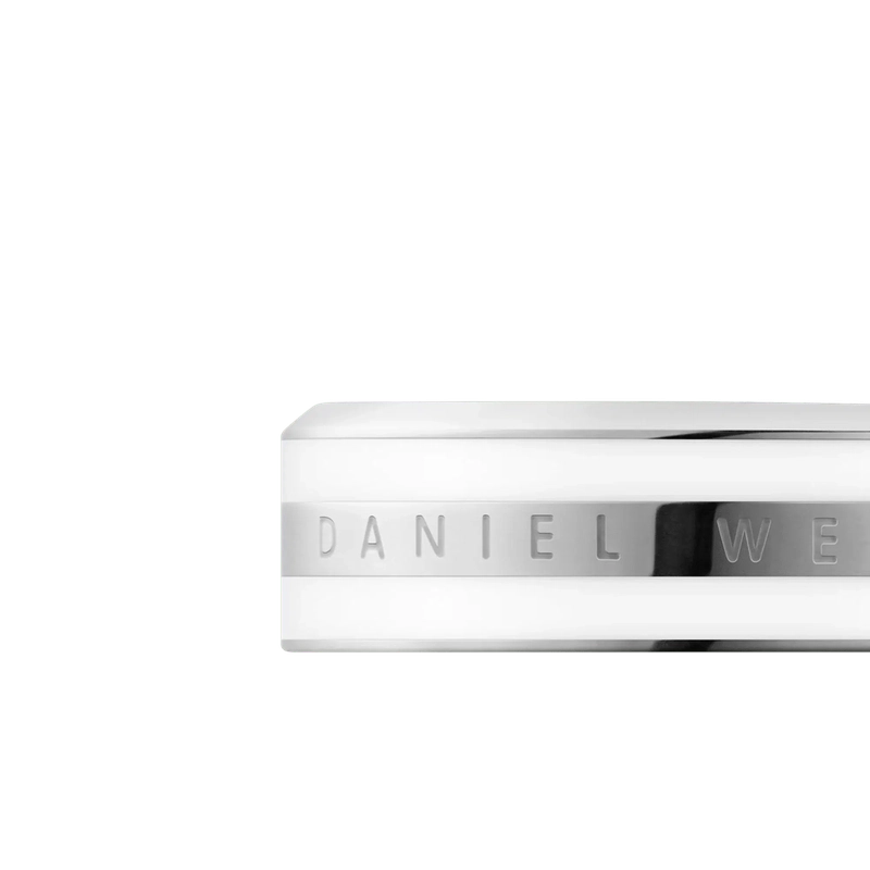 Daniel Wellington Emalie ring in polished silver stainless steel with white enamel inlay and engraved logo detail.