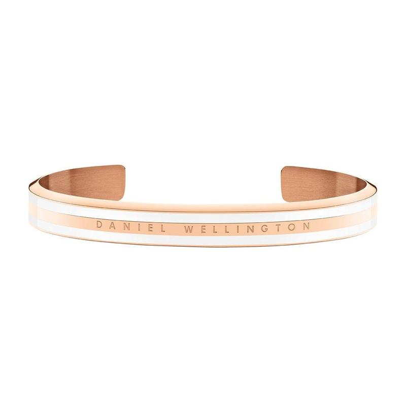 Elegant rose gold Daniel Wellington Emalie slim cuff bangle with white enamel inlay and engraved logo.
