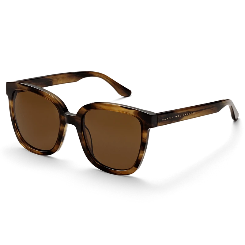 Oversized Daniel Wellington Grande sunglasses in brown demi bio-acetate with amber lenses for stylish UV protection.