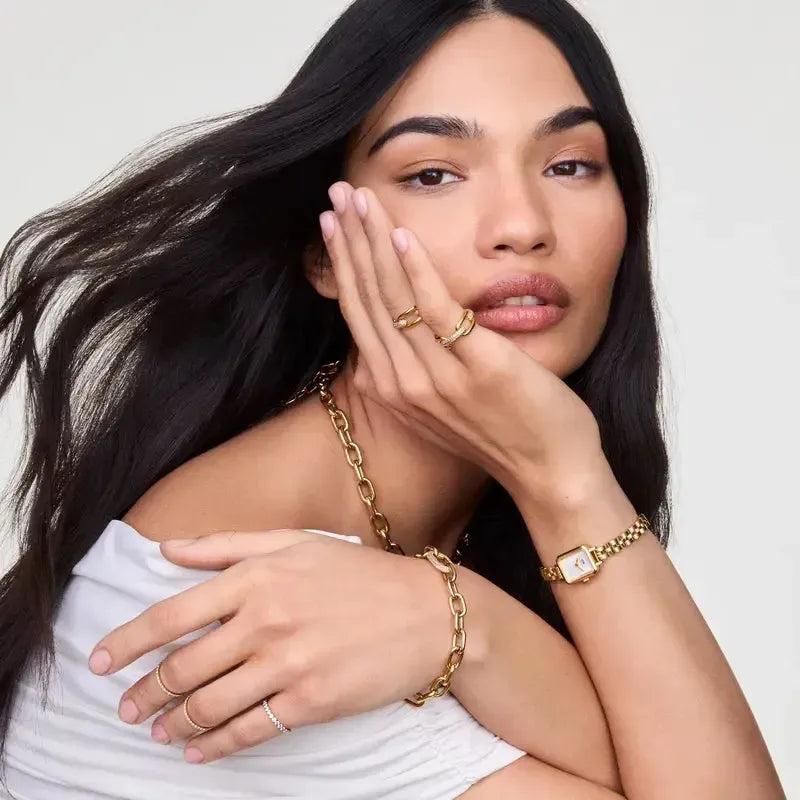Daniel Wellington Mirelle gold eternity ring featuring a sleek 1.4mm band with shimmering white cubic zirconia stones.