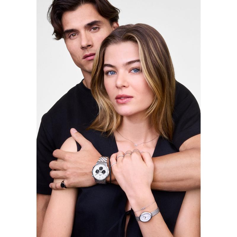 Elegant Daniel Wellington sterling silver infinity necklace featuring delicate white cubic zirconia stones on a polished chain.