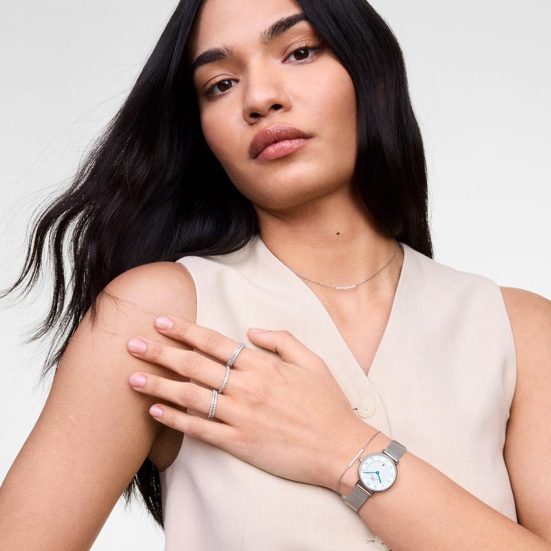Minimalist Daniel Wellington sterling silver eternity ring featuring a delicate band of sparkling white stones.