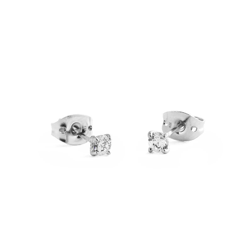 Daniel Wellington Mirelle solitaire stud earrings in polished silver with a 3mm round white stone in a minimalist setting.