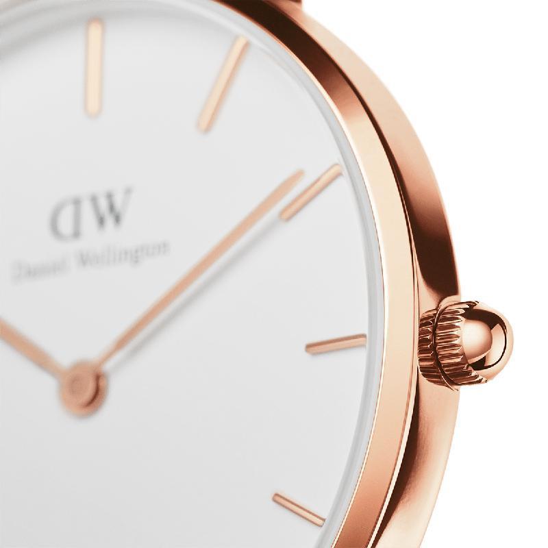 Daniel Wellington Petite 32mm watch featuring a minimalist eggshell white dial and elegant rose gold case.