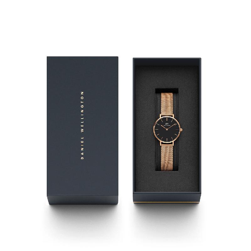 Daniel Wellington Petite Melrose 28mm watch featuring a black dial and rose gold mesh strap in a premium gift box.