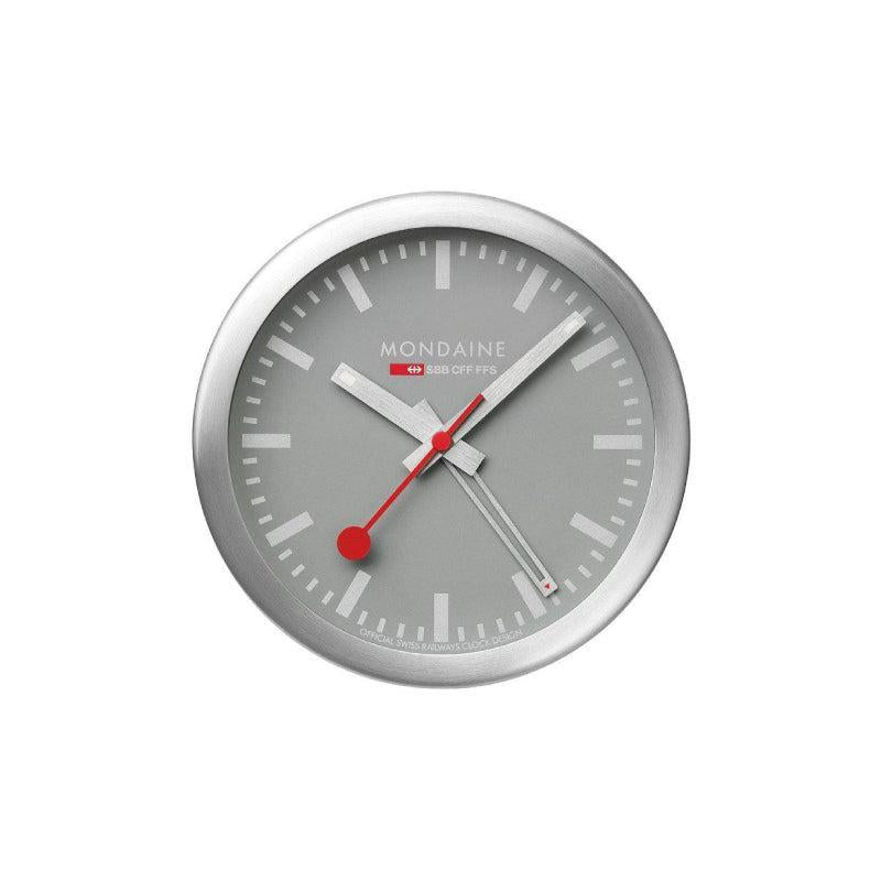 Mondaine 12.5cm mini wall and desk clock in brushed aluminum with a gray Alpine-inspired dial and iconic red second hand.