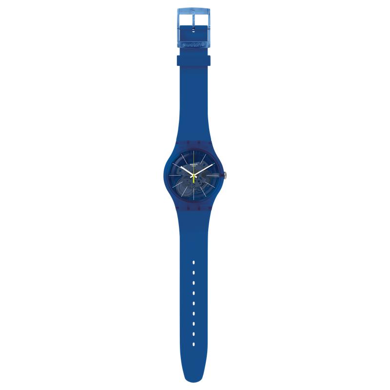 Swatch BLUE SIRUP watch with a translucent blue case, frosted silicone strap, and an exposed skeleton dial design.