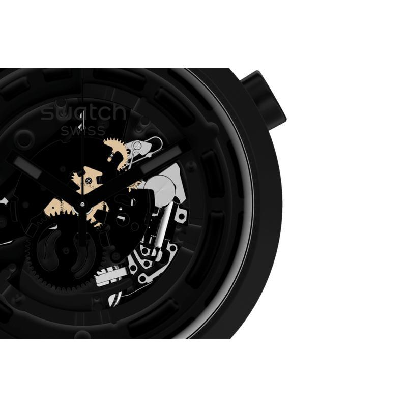 Swatch C-BLACK watch featuring a bold 47mm matte black bioceramic case and a sophisticated transparent skeleton dial.