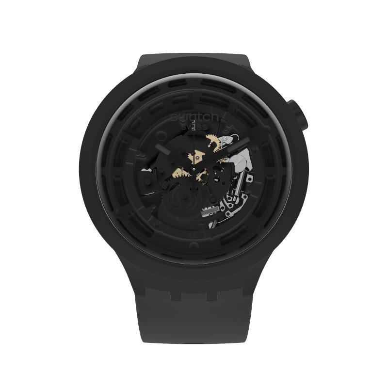 Swatch C-BLACK watch in matte black bioceramic with a bold transparent dial and exposed mechanical movement.