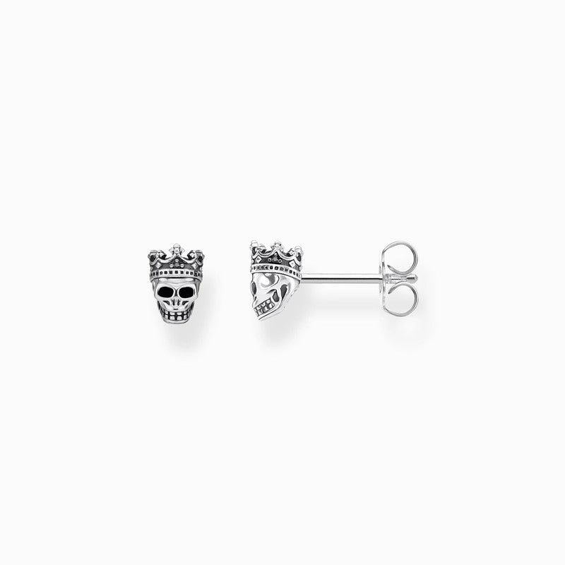 Thomas Sabo blackened sterling silver skull stud earrings featuring a crown with sparkling black zirconia stones.