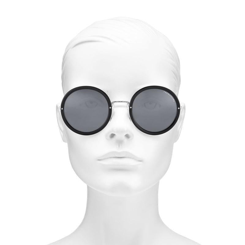 Thomas Sabo Romy round oversized sunglasses with silver metal frame, black acetate lens edging, and signature dot relief design.