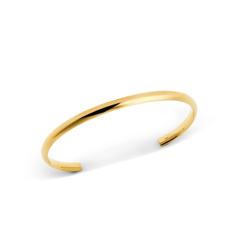 Minimalist 4mm Daniel Wellington Arch Cuff in polished gold with a smooth, rounded, gender-inclusive design.
