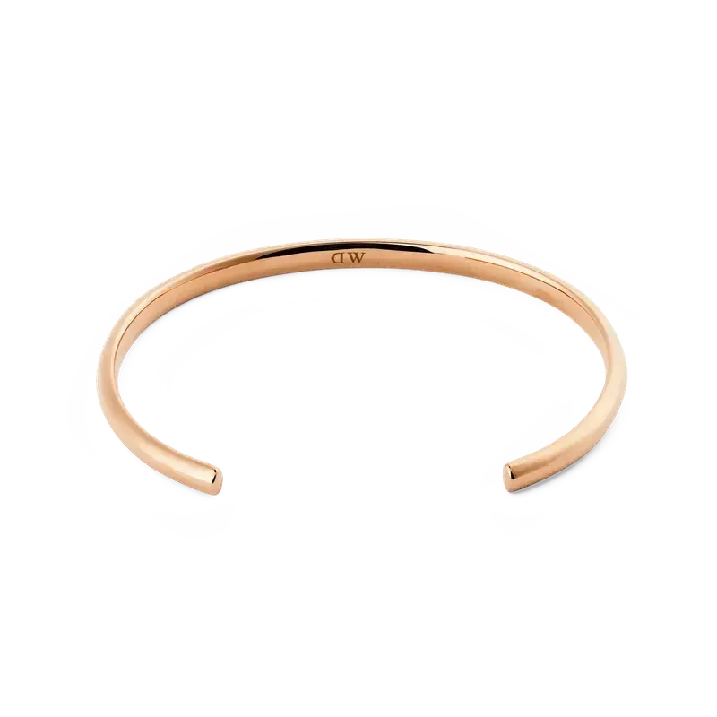 Minimalist 4mm Daniel Wellington Arch Cuff in polished rose gold with a sleek, rounded silhouette and internal logo.