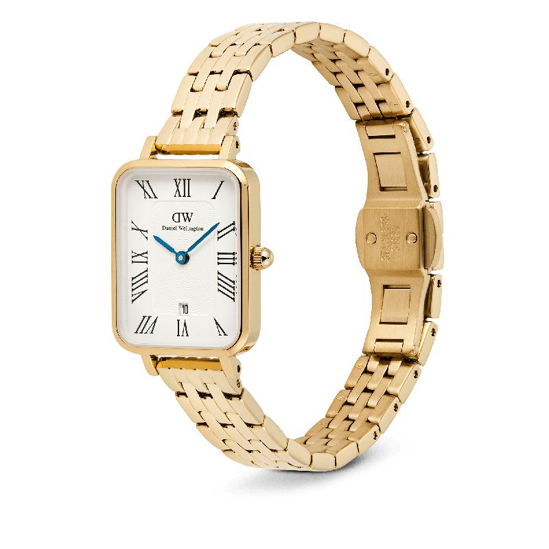 Daniel Wellington Quadro gold watch with white dial, Roman numerals, and a polished 5-link stainless steel bracelet.