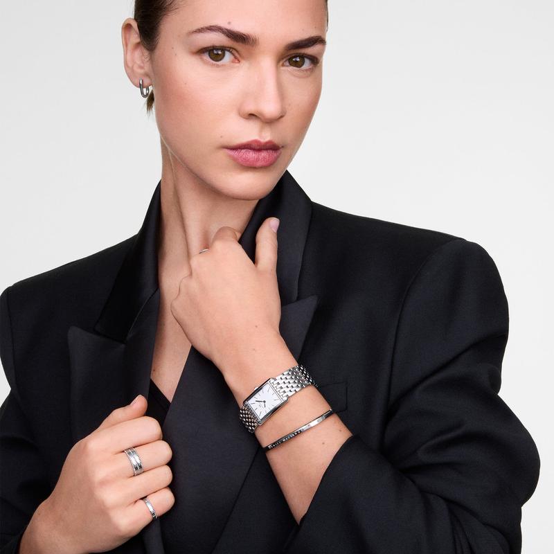 Polished sterling silver Daniel Wellington ring featuring two rows of sparkling white crystals on a sleek, modern band.