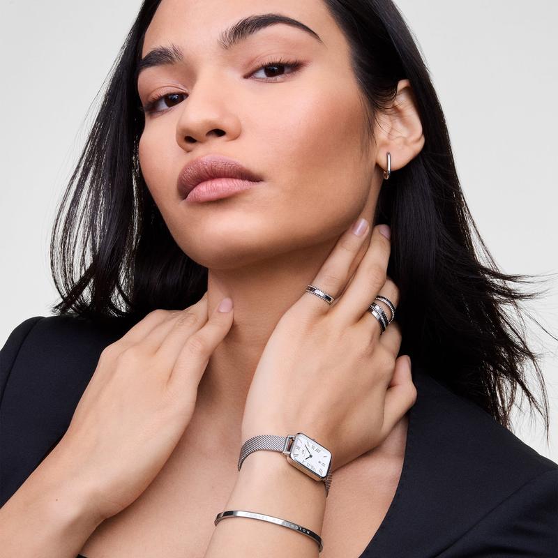 Polished 925 sterling silver Daniel Wellington ring featuring a delicate row of sparkling white crystals on a minimalist band.