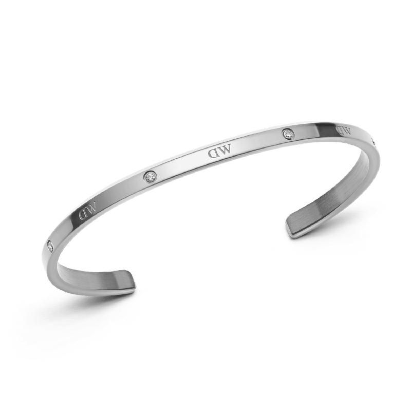 Adjustable silver stainless steel Daniel Wellington Classic Lumine cuff bracelet featuring six sparkling crystals.