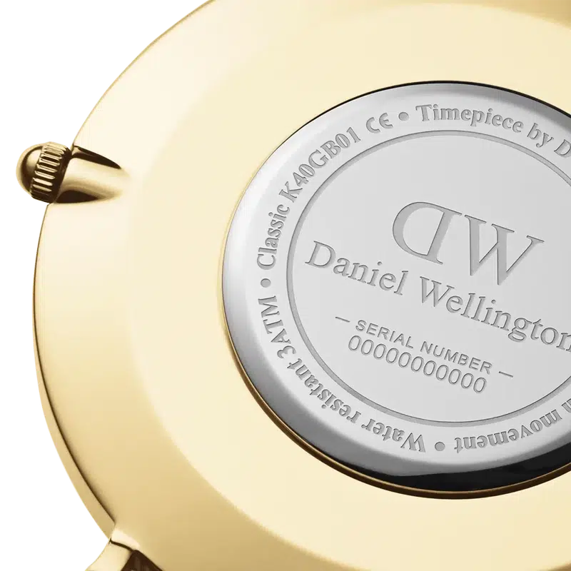 Close-up of the gold-plated stainless steel case back of a 40mm Daniel Wellington Classic Sheffield watch.