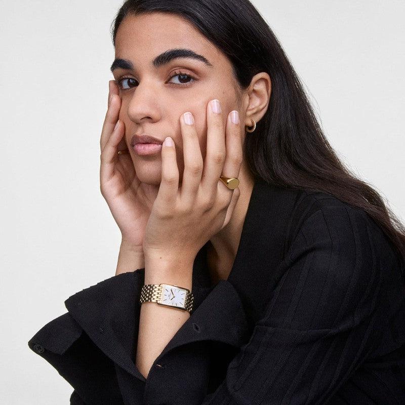 Elegant gold PVD-plated stainless steel Classic Signet Ring worn on a finger, featuring a polished, light-reflecting flat surface.
