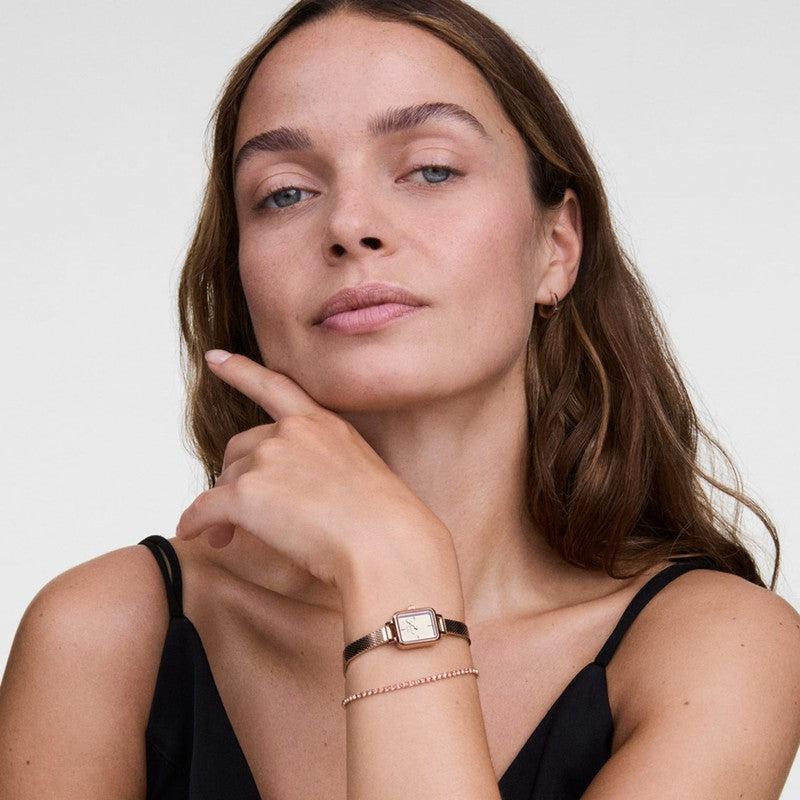Radiant rose gold Daniel Wellington tennis bracelet with shimmering crystals and adjustable stainless steel chain.