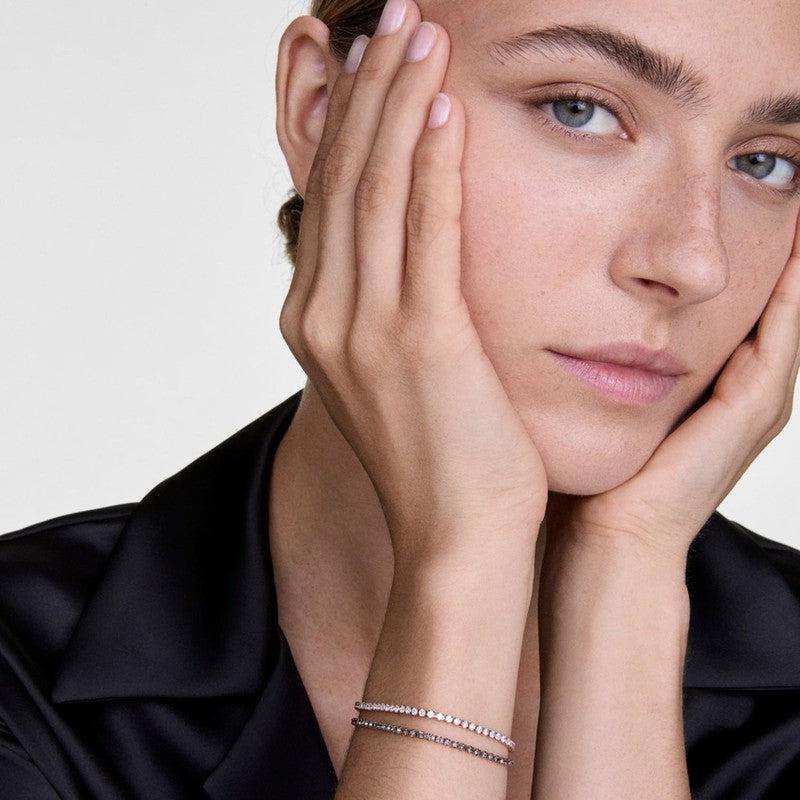 Radiant Daniel Wellington silver tennis bracelet featuring shimmering crystals set in durable 316L stainless steel.