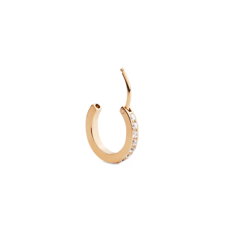 Daniel Wellington 13.6mm gold-plated stainless steel hoop earring featuring a sparkling crystal claw setting.