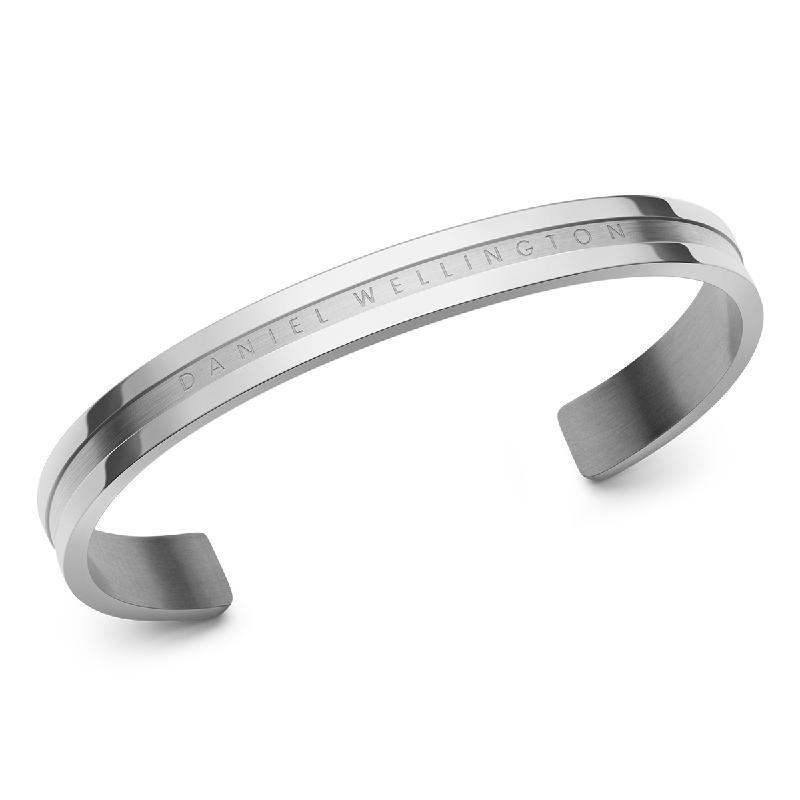 Daniel Wellington Elan silver stainless steel cuff bracelet with elegant engraved branding.