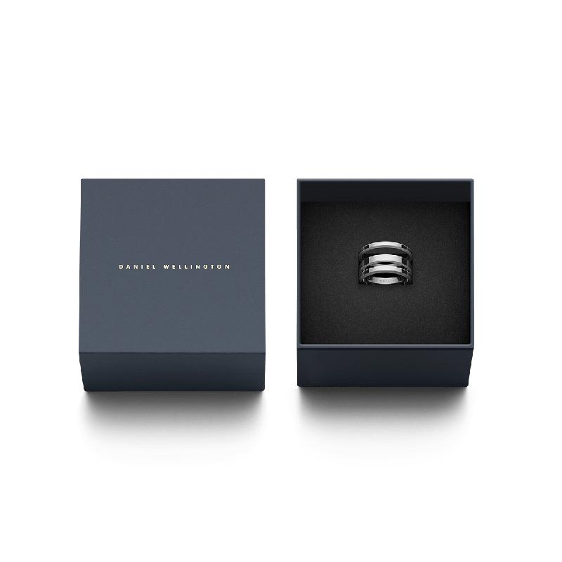 Daniel Wellington Elan Triad silver stainless steel ring featuring a sleek triple-band design in a branded gift box.