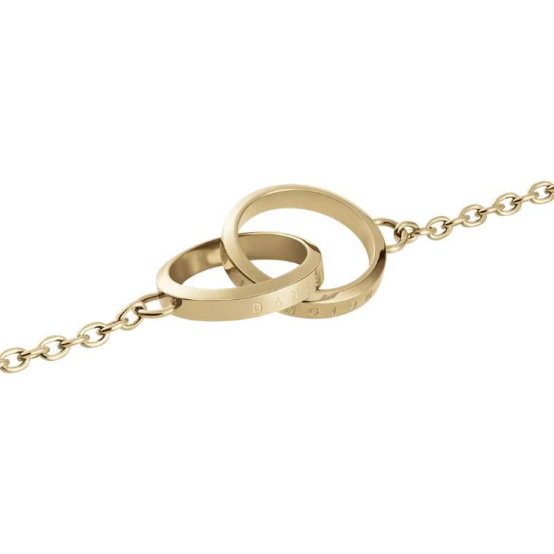 Elegant gold Daniel Wellington Elan Unity bracelet featuring two interlocking rings on a delicate stainless steel chain.