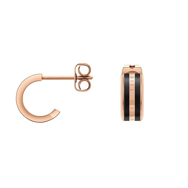 Daniel Wellington Emalie earrings in rose gold-plated stainless steel with black enamel inlay and subtle brand engraving.