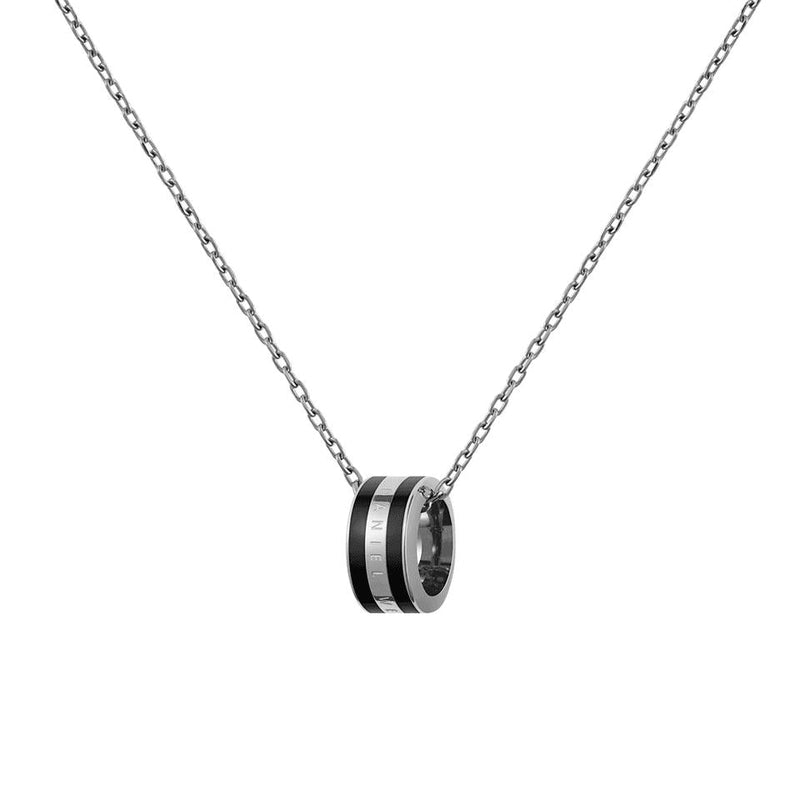 Daniel Wellington Emalie necklace featuring a sleek silver chain and a black enamel ring pendant with engraved branding.
