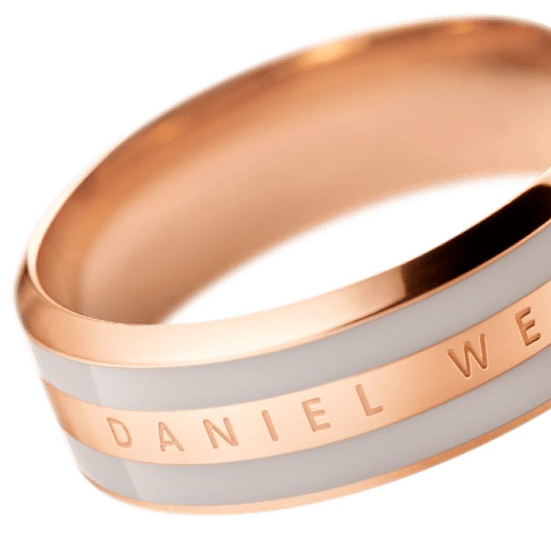 Daniel Wellington Emalie ring in desert sand enamel and rose gold stainless steel with an engraved logo band.