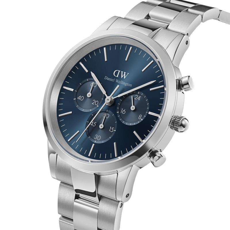 Daniel Wellington 42mm Iconic Chronograph watch in silver stainless steel with a striking blue sunray dial and link strap.