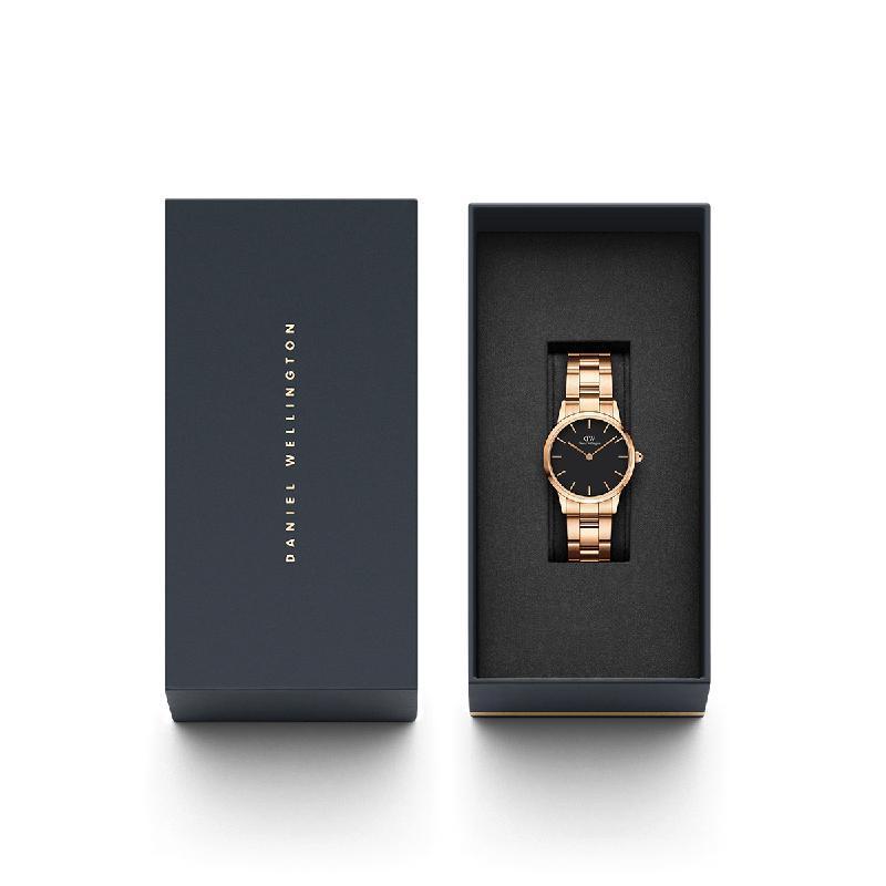 Daniel Wellington Iconic Link 28mm rose gold watch with black dial in a premium presentation gift box.