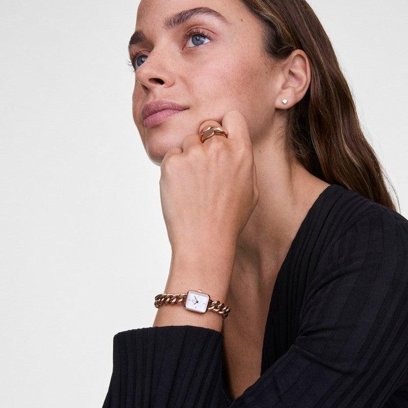 Daniel Wellington Jolie Chain watch in rose gold with a white dial and elegant stainless steel chain strap.