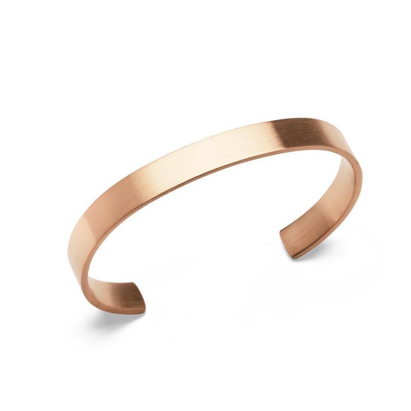 Minimalist Daniel Wellington Line Cuff in brushed rose gold stainless steel with a sleek, modern 7 mm profile.