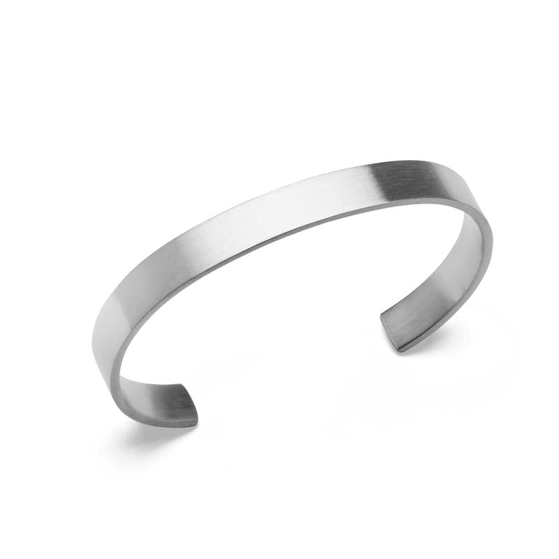 Minimalist Daniel Wellington Line Cuff in brushed silver with a sleek, modern 7 mm profile for everyday elegance.