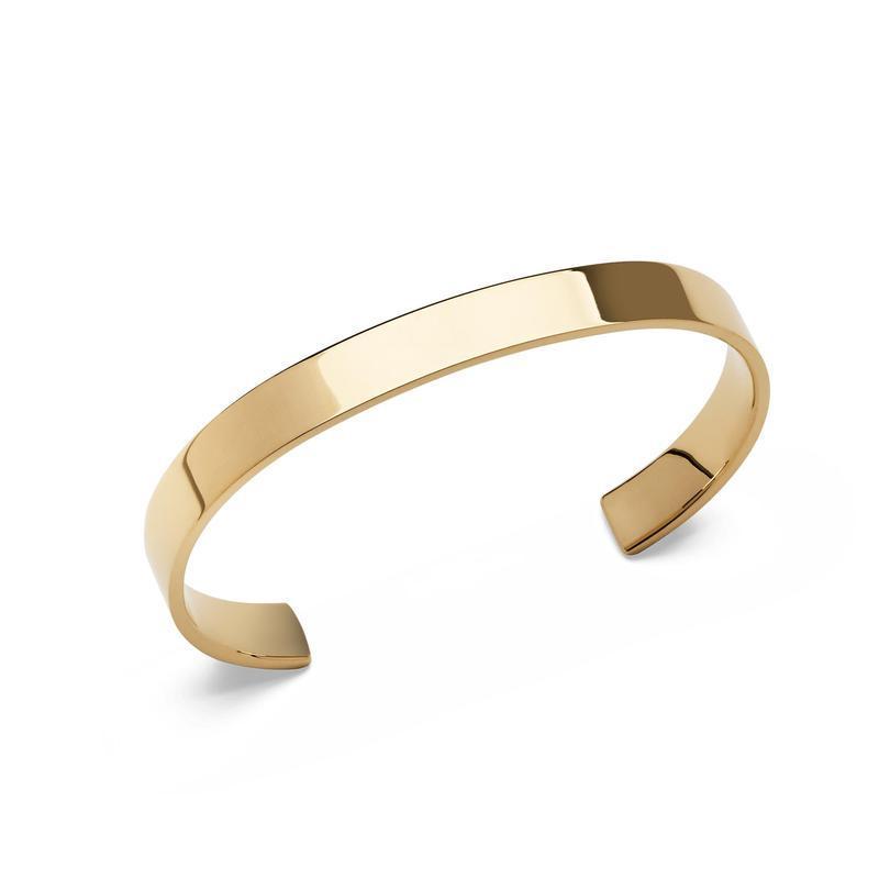 Minimalist 7mm polished gold cuff bracelet with a sleek, open design for a refined and contemporary everyday look.