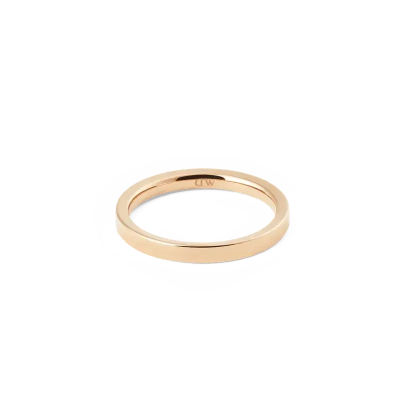 Minimalist 2.5mm polished rose gold band ring with a refined, modern silhouette and subtle interior DW logo engraving.