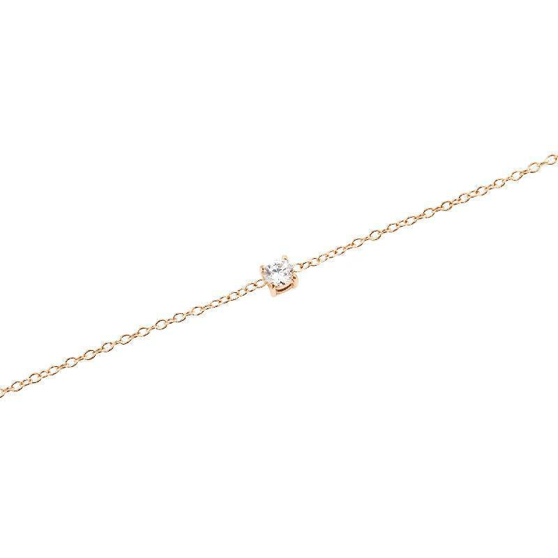 Minimalist rose gold bracelet featuring a delicate chain and a single 3mm white solitaire stone.