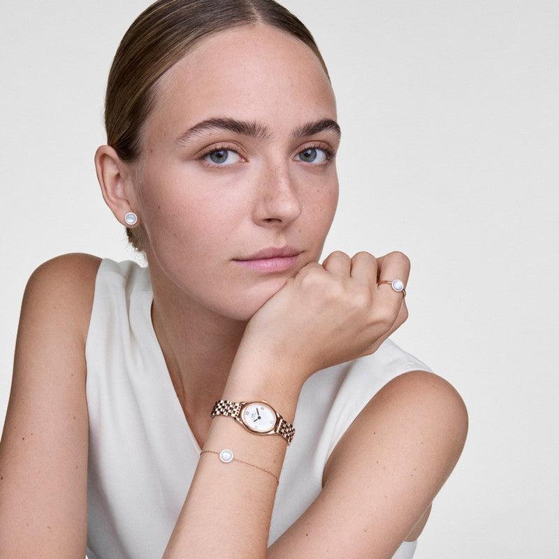 Daniel Wellington Ophelia Mini watch in rose gold with a white dial and elegant 5-link stainless steel strap.