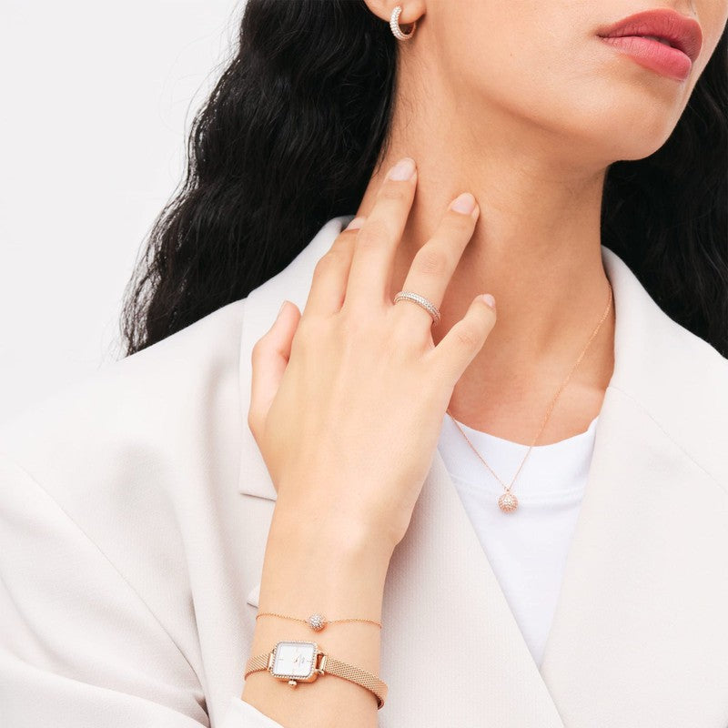Rose gold Daniel Wellington Pavé crystal pendant bracelet with a sparkling, claw-set CZ crystal on a stainless steel chain.