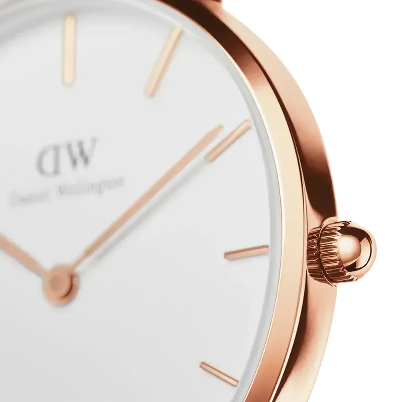 Daniel Wellington Petite 32mm watch featuring a minimalist eggshell white dial and elegant rose gold case.